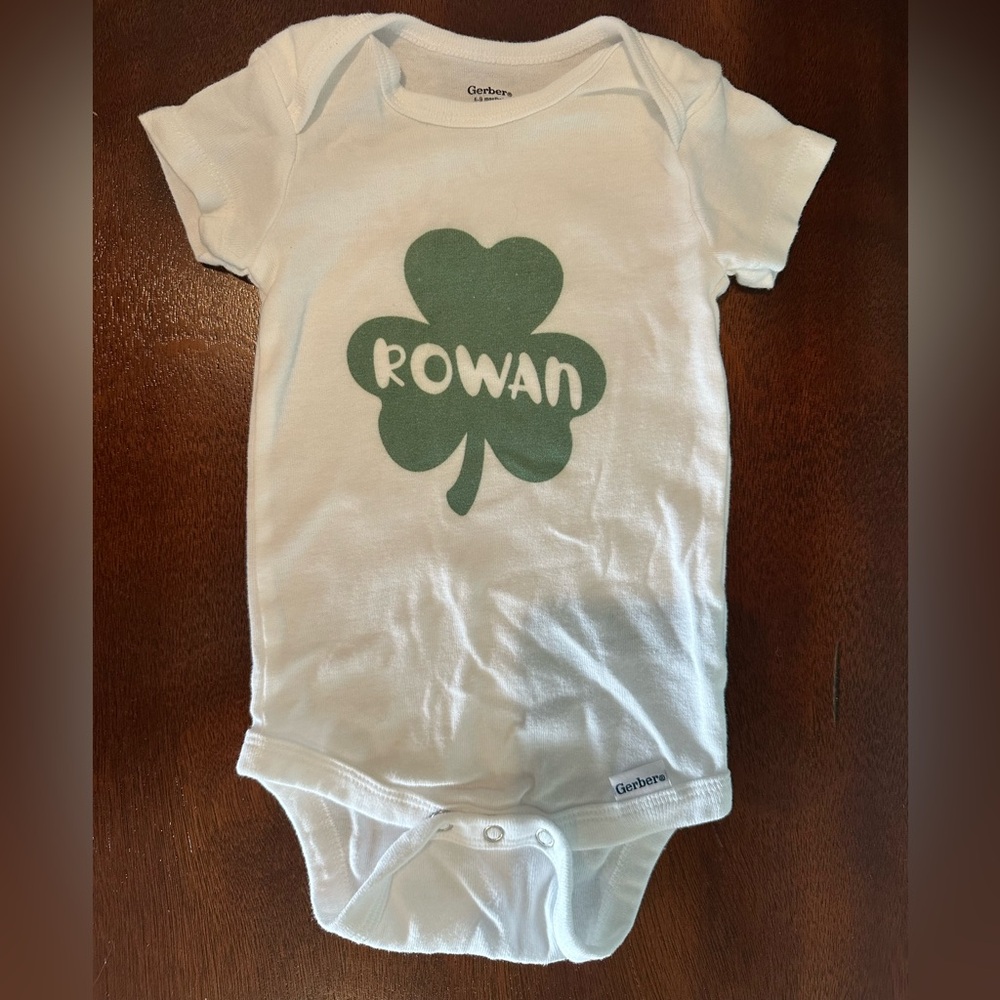 Personalized “Rowan” Gerber White Onesie with Green Shamrock Design